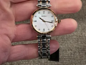 Seiko Elegant Womens Dress Watch with Diamond Accents and Mother-of-Pearl Dial